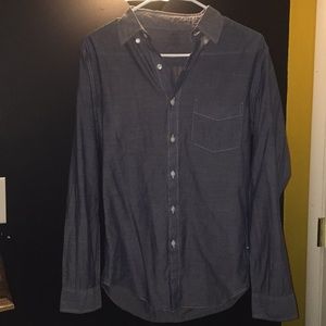 Long-sleeved button down J crew shirt.